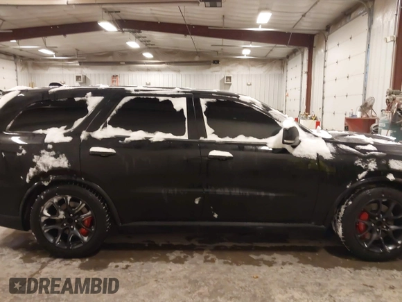 2021 Dodge Durango R/T z VIN 1C4SDJCT6MC556598, wystawiony jako IAAI lot #41545122 z przebiegiem 40 654 mil mil oraz . Historia ofert i sprzedaży dostępna na DreamBid. Obrazek 13.
