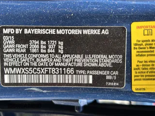 2015 MINI Hardtop 4 Door with VIN WMWXS5C5XFT831166, listed as a Copart auction lot 56714285 with 69,668 mi miles and Salvage Title. Bid and sale history available at DreamBid. Image 10.