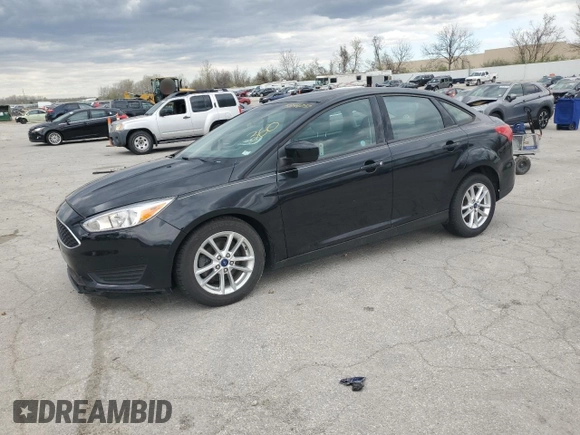 2018 Ford Focus SE with VIN 1FADP3FE6JL228558, listed as a Copart auction lot 51046035 with 71,016 mi miles and Salvage Title. Bid and sale history available at carsss.com. Image 1.