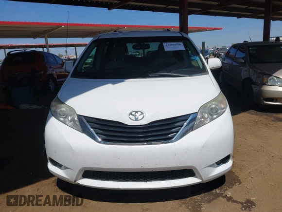 2012 Toyota Sienna LE AAS with VIN 5TDKK3DC4CS274117, listed as a IAAI auction lot 42008690 with 205,353 mi miles. Bid and sale history available at carsss.com. Image 12.