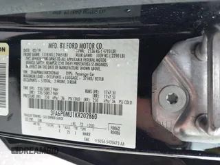 2019 Ford Fusion Hybrid SEL with VIN 3FA6P0MU1KR202860, listed as a IAAI auction lot 41983299 with 133,671 mi miles. Bid and sale history available at carsss.com. Image 9.