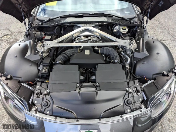 2019 Aston Martin Vantage with VIN SCFSMGAW4KGN0143X, listed as a Copart auction lot 49525045 with 9,949 mi miles and Clean Title. Bid and sale history available at carsss.com. Image 7.