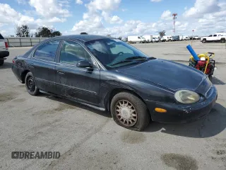 1997 Mercury Sable GS z VIN 1MELM50U1VA620597, wystawiony jako Copart lot #51635765 z przebiegiem 250 824 mil mil oraz Szkoda całkowita • Salvage title. Historia ofert i sprzedaży dostępna na DreamBid. Obrazek 4.