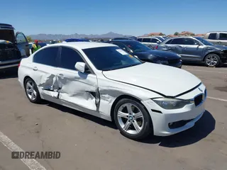2015 BMW 3 Series 328i with VIN WBA3C1C52FK117753, listed as a IAAI auction lot 42270013 with 147,386 mi miles and . Bid and sale history available at DreamBid. Image 6.