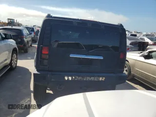 2003 Hummer H2 with VIN 5GRGN23U13H143781, listed as a Copart auction lot 77833264 with 0 mi miles and Salvage Title. Bid and sale history available at carsss.com. Image 6.
