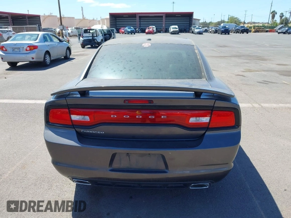 2014 Dodge Charger SXT with VIN 2C3CDXHG0EH308014, listed as a IAAI auction lot 41798872 with 115,247 mi miles and . Bid and sale history available at DreamBid. Image 16.