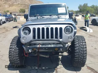2018 Jeep Wrangler Unlimited Sport with VIN 1C4BJWDG4JL807265, listed as a IAAI auction lot 42520648 with 69,229 mi miles and . Bid and sale history available at DreamBid. Image 13.