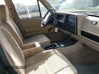 1996 Jeep Cherokee Sport with VIN 1J4FJ68S1TL204870, listed as a IAAI auction lot 41726962 with 93,462 mi miles. Bid and sale history available at carsss.com. Image 5.