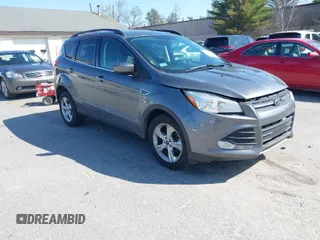 2014 Ford Escape SE with VIN 1FMCU0GX7EUC46334, listed as a IAAI auction lot 41932120 with 126,861 mi miles. Bid and sale history available at carsss.com. Image 1.