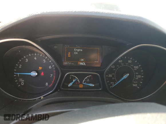 2017 Ford Focus SE z VIN 1FADP3F22HL312683, wystawiony jako Copart lot #53385315 z przebiegiem 88 751 mil mil oraz Szkoda całkowita • Salvage title. Historia ofert i sprzedaży dostępna na DreamBid. Obrazek 9.