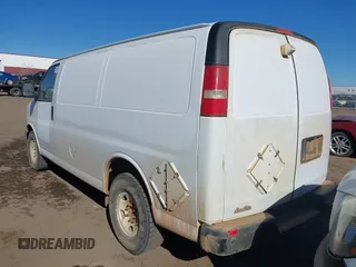 2014 Chevrolet Express Cargo Van with VIN 1GCWGFCAXE1205405, listed as a IAAI auction lot 41700218 with 397,332 mi miles. Bid and sale history available at carsss.com. Image 3.