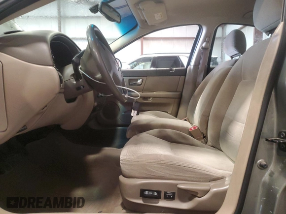 2002 Mercury Sable with VIN 1MEFM58U82G612541, listed as a Copart auction lot 60254405 with 171,854 mi miles and Salvage title. Bid and sale history available at DreamBid. Image 7.