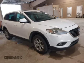 2014 Mazda CX-9 Touring with VIN JM3TB2CA8E0430199, listed as a IAAI auction lot 42090612 with 188,412 mi miles and . Bid and sale history available at carsss.com. Image 1.