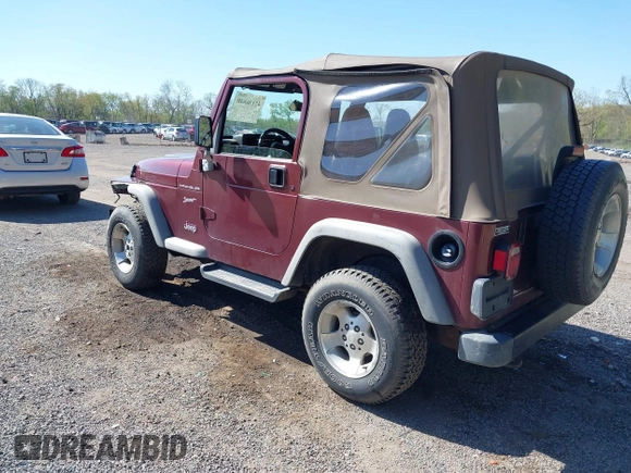 2002 Jeep Wrangler Sport with VIN 1J4FA49SX2P713303, listed as a IAAI auction lot 42136848 with 152,822 mi miles. Bid and sale history available at carsss.com. Image 3.