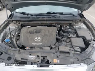 2014 Mazda 3 i Touring with VIN JM1BM1L76E1204265, listed as a IAAI auction lot 42565471 with 68,675 mi miles and . Bid and sale history available at DreamBid. Image 10.