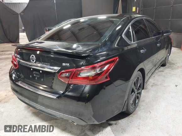 2017 Nissan Altima SV with VIN 1N4AL3AP4HC239740, listed as a IAAI auction lot 41971212 with 104,823 mi miles and . Bid and sale history available at carsss.com. Image 4.