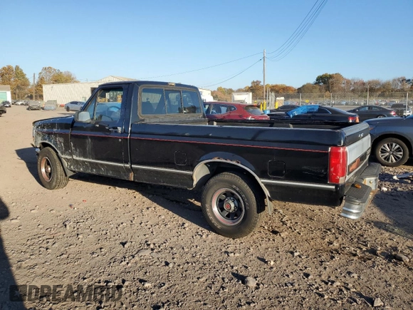 1992 Ford F-150 with VIN 1FTDF15Y9NLA29099, listed as a Copart auction lot 76238474 with 235,130 mi miles and Salvage Title. Bid and sale history available at carsss.com. Image 2.