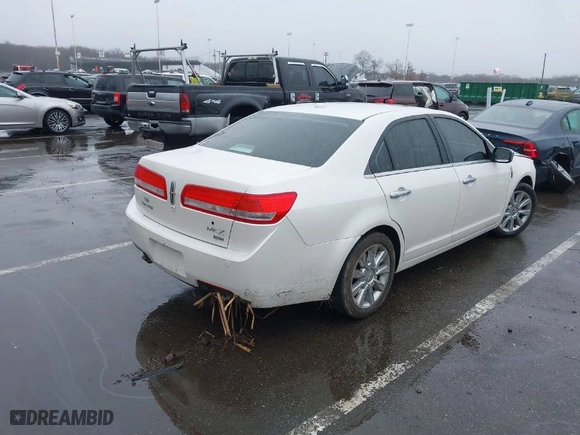 2012 Lincoln MKZ with VIN 3LNHL2JCXCR813912, listed as a IAAI auction lot 41560299 with 153,806 mi miles. Bid and sale history available at carsss.com. Image 4.