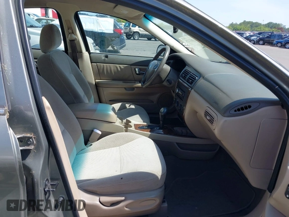 2002 Mercury Sable GS z VIN 1MEFM50U42G638338, wystawiony jako IAAI lot #42100728 z przebiegiem 208 055 mil mil oraz . Historia ofert i sprzedaży dostępna na DreamBid. Obrazek 6.