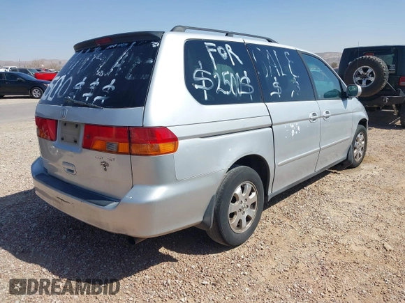 2004 Honda Odyssey EX-L with VIN 5FNRL18904B080009, listed as a IAAI auction lot 41736651 with 461,326 mi miles and . Bid and sale history available at DreamBid. Image 4.