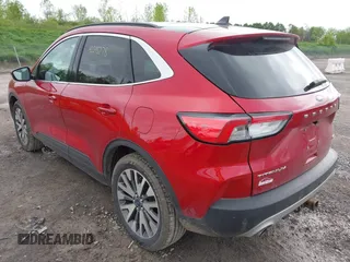 2020 Ford Escape Titanium with VIN 1FMCU9J99LUB28104, listed as a IAAI auction lot 42295278 with 73,706 mi miles and . Bid and sale history available at DreamBid. Image 3.