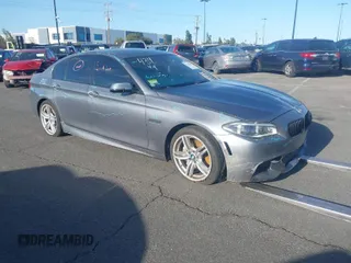 2014 BMW 5 Series 550i z VIN WBAKN9C52ED000911, wystawiony jako IAAI lot #41762042 z przebiegiem 88 240 mil mil oraz . Historia ofert i sprzedaży dostępna na DreamBid. Obrazek 1.