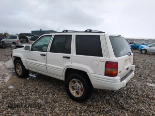 1996 Jeep Grand Cherokee Limited with VIN 1J4GZ78Y0TC185669, listed as a Copart auction lot 79032274 with 184,929 mi miles and Salvage Title. Bid and sale history available at carsss.com. Image 2.