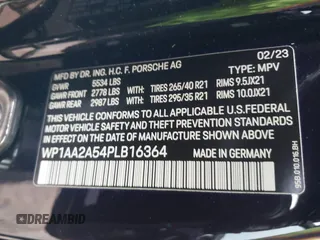 2023 Porsche Macan with VIN WP1AA2A54PLB16364, listed as a IAAI auction lot 41624533 with 30,309 mi miles. Bid and sale history available at carsss.com. Image 9.