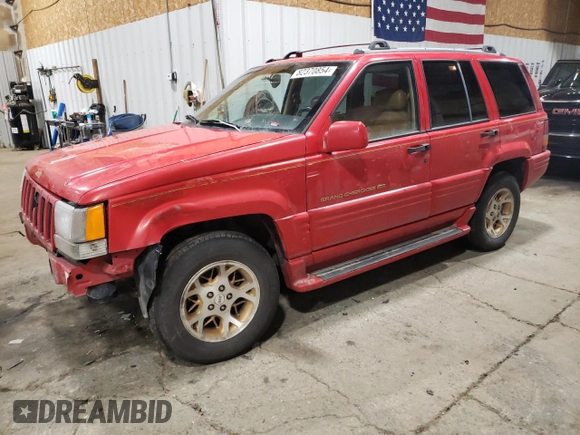 1996 Jeep Grand Cherokee Limited with VIN 1J4GZ78Y3TC186413, listed as a Copart auction lot 82370854 with 261,630 mi miles and Salvage Title. Bid and sale history available at carsss.com. Image 1.