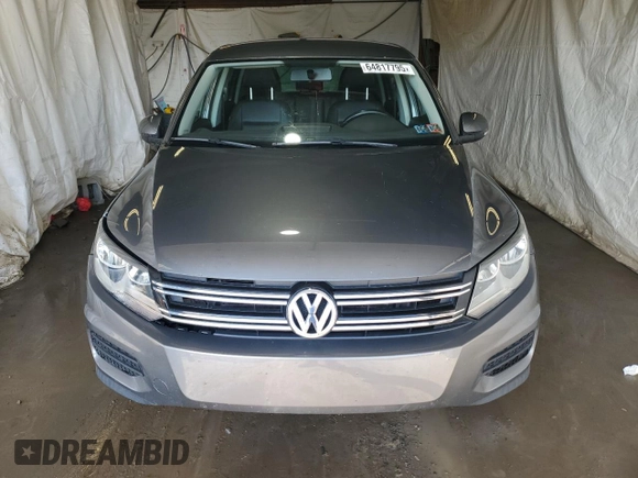 2014 Volkswagen Tiguan SEL with VIN WVGBV3AX2EW541476, listed as a Copart auction lot 64817795 with 158,032 mi miles and Salvage title. Bid and sale history available at DreamBid. Image 5.