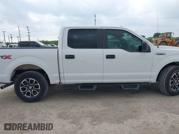 2018 Ford F-150 XL with VIN 1FTEW1C52JKC49228, listed as a IAAI auction lot 42162616 with 148,329 mi miles. Bid and sale history available at carsss.com. Image 13.