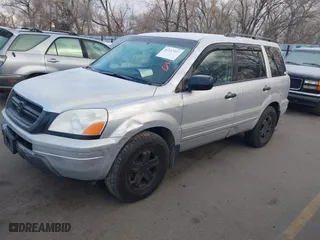 2004 Honda Pilot EX with VIN 2HKYF18654H582766, listed as a IAAI auction lot 41537873 with 294,035 mi miles. Bid and sale history available at carsss.com. Image 2.