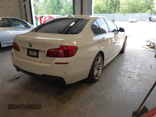 2014 BMW 5 Series 535i xDrive with VIN WBA5B3C58ED530822, listed as a IAAI auction lot 42561366 with 137,880 mi miles and . Bid and sale history available at DreamBid. Image 4.