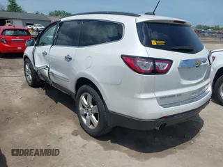 2017 Chevrolet Traverse Premier with VIN 1GNKVJKD8HJ135904, listed as a IAAI auction lot 42576473 with 92,526 mi miles and . Bid and sale history available at DreamBid. Image 3.
