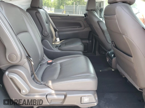 2019 Honda Odyssey Touring with VIN 5FNRL6H81KB051846, listed as a Copart auction lot 58723015 with 68,142 mi miles and Salvage title. Bid and sale history available at DreamBid. Image 11.