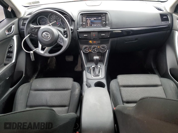 2014 Mazda CX-5 Touring with VIN JM3KE2CY8E0424757, listed as a Copart auction lot 54703195 with 111,401 mi miles and Salvage Title. Bid and sale history available at DreamBid. Image 8.