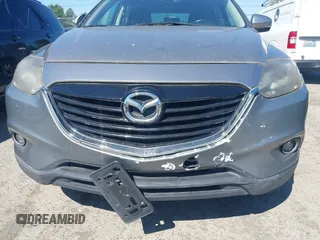 2014 Mazda CX-9 Grand Touring with VIN JM3TB2DA9E0435295, listed as a IAAI auction lot 42618683 with 177,783 mi miles and . Bid and sale history available at DreamBid. Image 6.