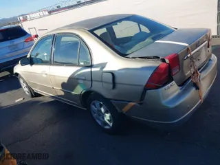 2001 Honda Civic EX with VIN JHMES267X1S003489, listed as a IAAI auction lot 41616246 with 184,664 mi miles. Bid and sale history available at carsss.com. Image 3.