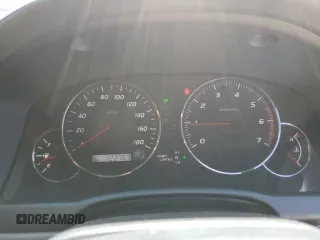 2002 Toyota Land Cruiser z VIN VZJ1210003634, wystawiony jako Copart lot #87504035 z przebiegiem 122 767 mil mil oraz Szkoda całkowita • Salvage title. Historia ofert i sprzedaży dostępna na DreamBid. Obrazek 9.
