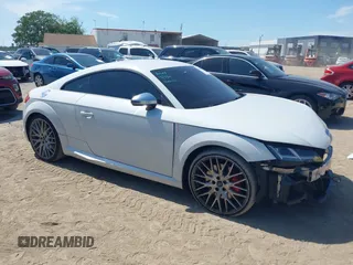 2016 Audi TTS 2.0T z VIN TRUC1AFV5G1030771, wystawiony jako IAAI lot #41940807 z przebiegiem 81 357 mil mil oraz . Historia ofert i sprzedaży dostępna na DreamBid. Obrazek 1.