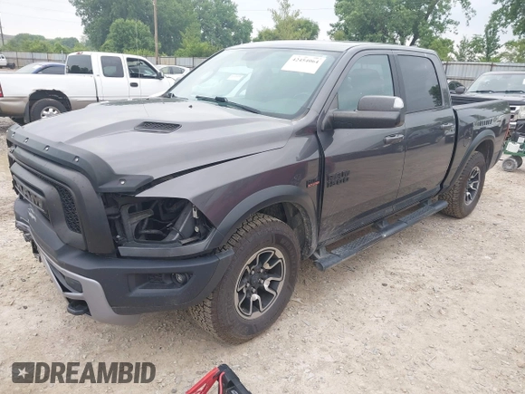 2017 Ram 1500 Rebel with VIN 1C6RR7YT5HS610293, listed as a IAAI auction lot 42454064 with 103,515 mi miles and . Bid and sale history available at DreamBid. Image 2.