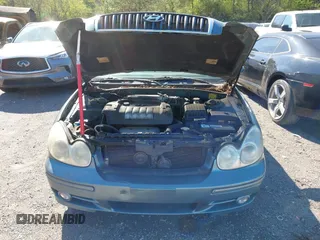 2004 Hyundai Sonata with VIN KMHWF25S74A048301, listed as a IAAI auction lot 41790506 with 179,740 mi miles. Bid and sale history available at carsss.com. Image 10.