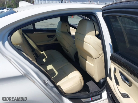 2013 BMW M5 with VIN WBSFV9C58DC773268, listed as a IAAI auction lot 41890830 with 128,399 mi miles. Bid and sale history available at carsss.com. Image 8.