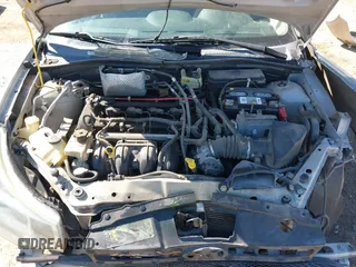 2008 Ford Focus SE z VIN 1FAHP35N18W162951, wystawiony jako IAAI lot #37857727 z przebiegiem 158 792 mil mil oraz . Historia ofert i sprzedaży dostępna na DreamBid. Obrazek 10.