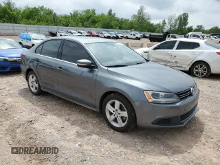 2014 Volkswagen Jetta TDI w/Premium with VIN 3VWLL7AJ7EM313598, listed as a Copart auction lot 54905595 with 162,036 mi miles and Salvage title. Bid and sale history available at DreamBid. Image 4.