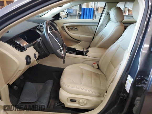 2015 Ford Taurus SEL with VIN 1FAHP2E84FG102318, listed as a Copart auction lot 61744685 with 82,149 mi miles and Salvage title. Bid and sale history available at DreamBid. Image 7.
