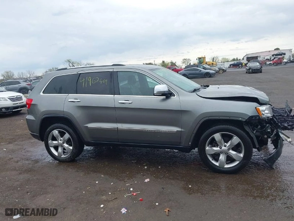 2012 Jeep Grand Cherokee Limited with VIN 1C4RJFBG0CC254425, listed as a IAAI auction lot 41962409 with 256,894 mi miles. Bid and sale history available at carsss.com. Image 13.