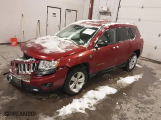 2012 Jeep Compass Latitude with VIN 1C4NJDEB7CD598623, listed as a IAAI auction lot 41611225 with 97,652 mi miles. Bid and sale history available at carsss.com. Image 2.