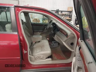 2005 Cadillac DeVille z VIN 1G6KD57Y85U107418, wystawiony jako IAAI lot #42352987 z przebiegiem 160 974 mil mil oraz . Historia ofert i sprzedaży dostępna na DreamBid. Obrazek 5.