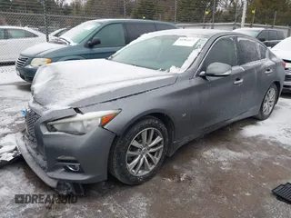 2015 Infiniti Q50 Premium with VIN JN1BV7AR0FM396192, listed as a IAAI auction lot 41564677 with 210,460 mi miles and . Bid and sale history available at DreamBid. Image 2.